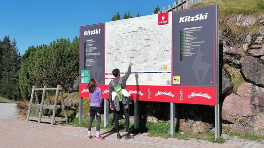 Panorama Info System with Almdudler advertising board in the Kitzbühel ski area