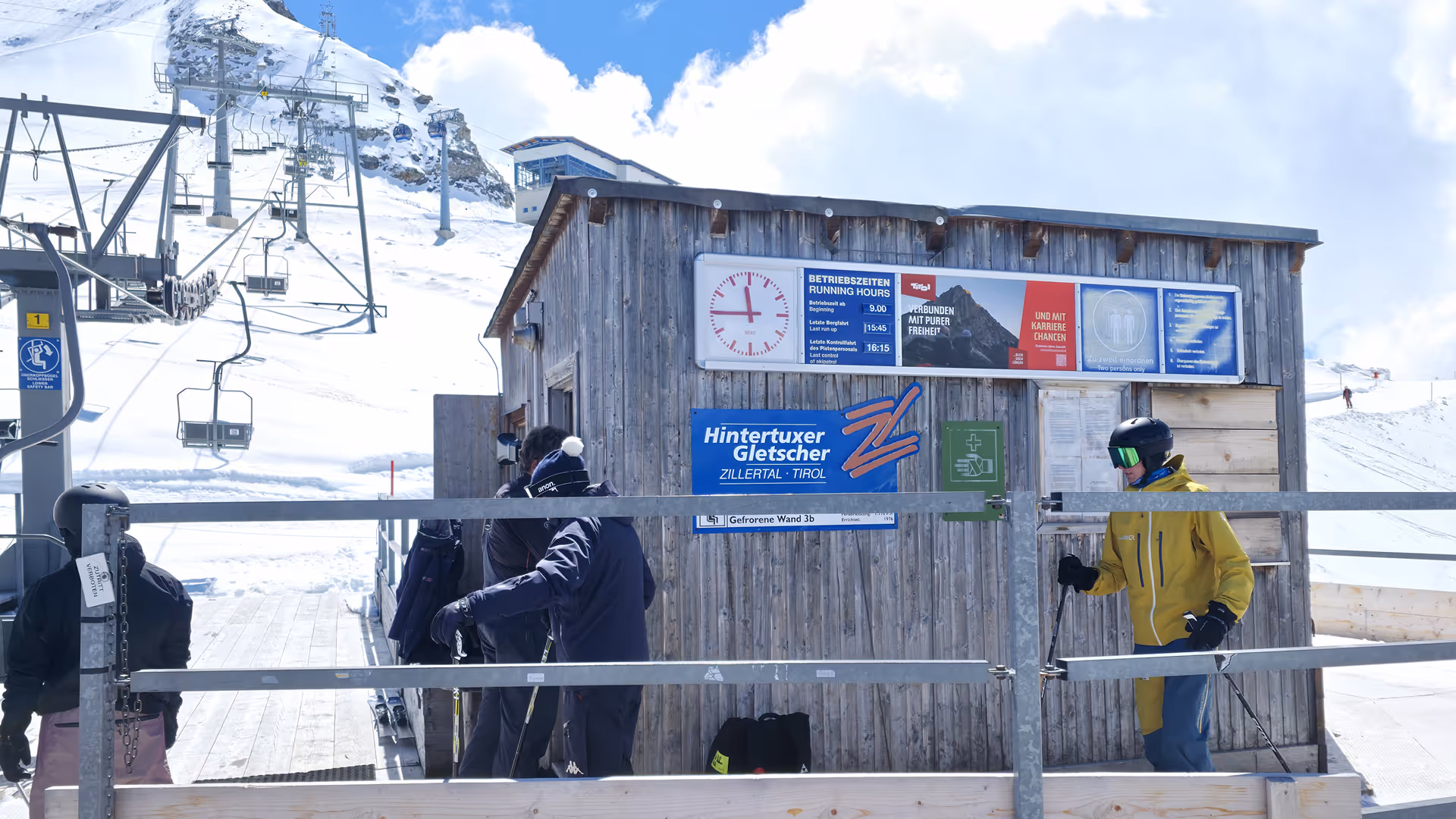 Clock board with Tirol Werbung summer theme at the valley station of the Gefrorene Wand T-bar lift in the Hintertux Glacier ski area