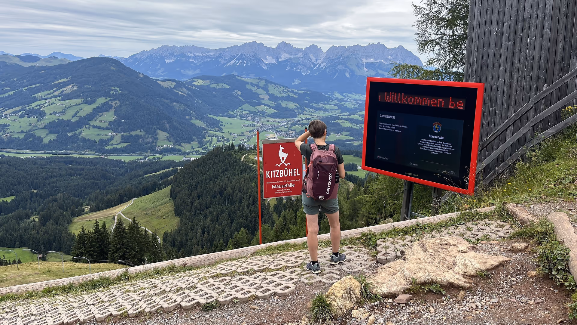 Digital signage panorama system in summer with information on the history of the Hahnenkamm races in KitzSki, Kitzbühel