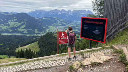 Digital signage panorama system in summer with information on the history of the Hahnenkamm races in KitzSki, Kitzbühel