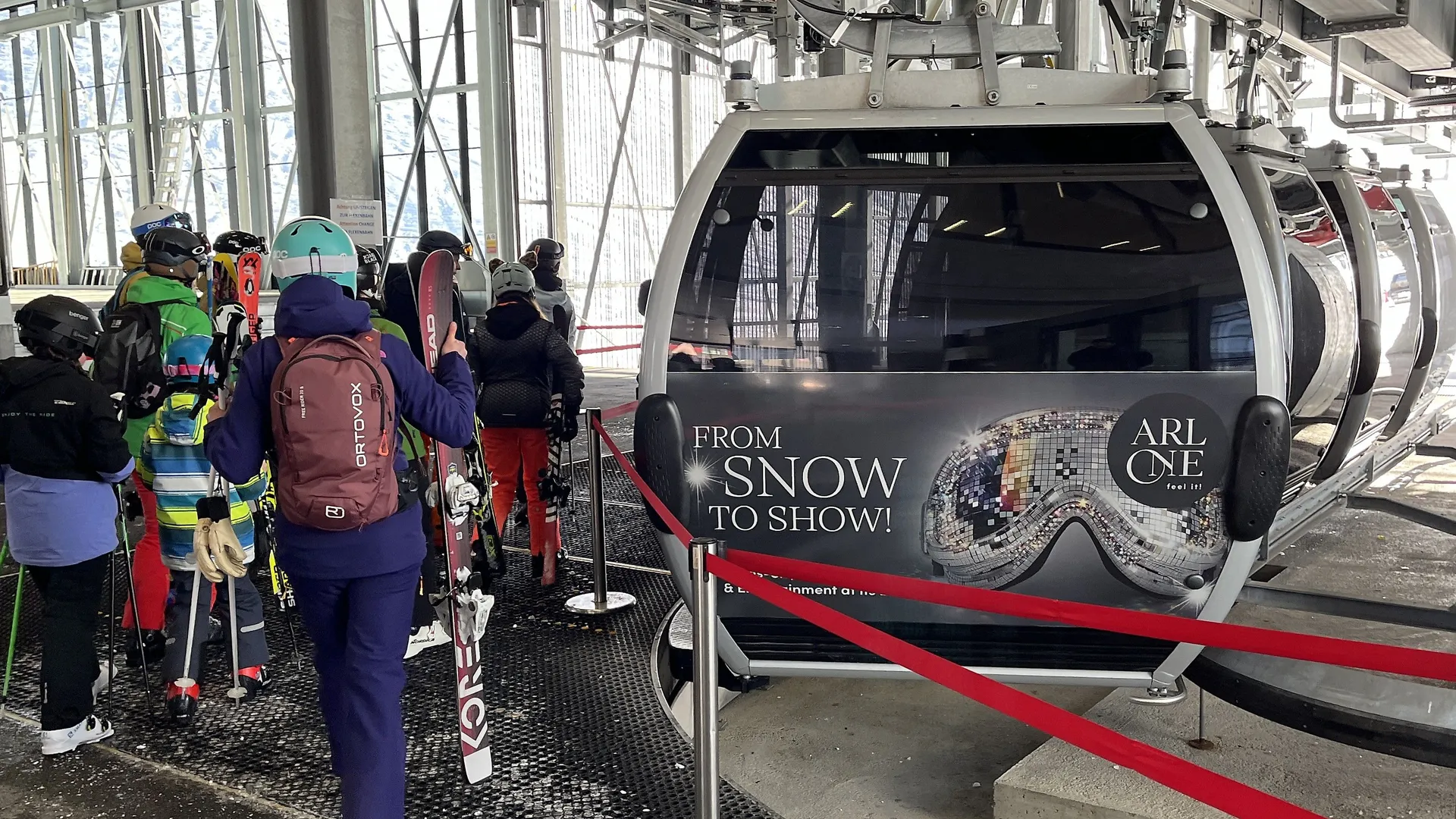 Gondolas with Arlone advertising at Ski Arlberg, St. Anton