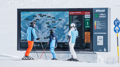 LED video wall with information on cable cars and lifts and freeride checkpoint in the KitzSki ski area, Kitzbühel