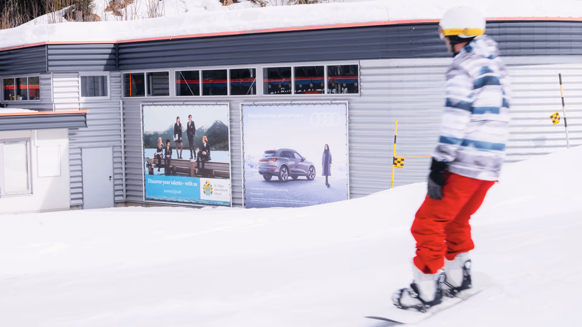 Megaboards as wall mounts, each with a motif from Audi and St. Gilgen International School in the KitzSki ski area, Kitzbühel